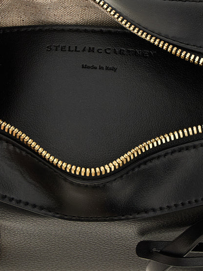 Crossbody Handbag by Stella McCartney for women in polyamide polyurethane leather black features a versatile chic silhouette, meticulously detailed with a secure zipper, ample , and versatile crossbody-strap, shoulder-strap, adjustable-strap & handle.