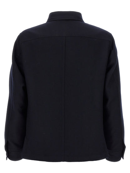 Overshirt by Tom Ford for men in wool & silk blue showcases a sharp silhouette, elegantly detailed with a sharp and sharp .