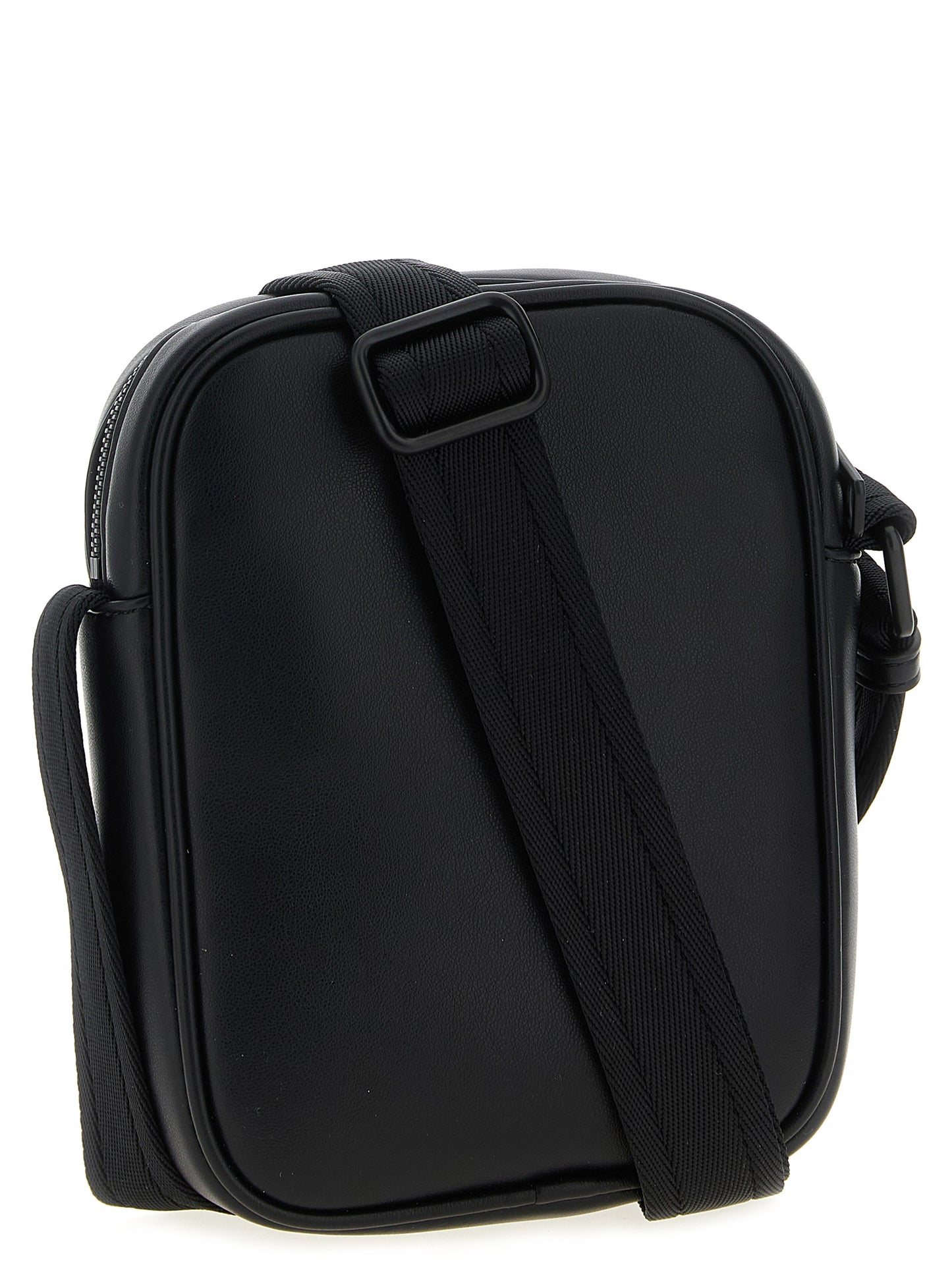 Crossbody Oval Handbag by Diesel for women in polyurethane leather black & signature features a transformative sophistication silhouette, showcasing a secure zipper, ample , and versatile crossbody-strap, shoulder-strap & adjustable-strap for a transformative sophistication look.