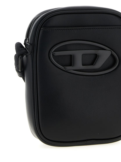 Crossbody Oval Handbag by Diesel for women in polyurethane leather black & signature features a multifaceted silhouette, showcasing a secure zipper and multifaceted with versatile crossbody-strap, shoulder-strap & adjustable-strap for multifaceted style.