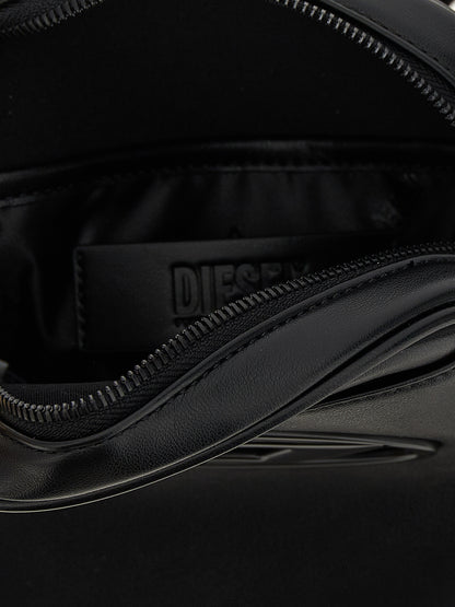 Crossbody Oval Handbag by Diesel for women in polyurethane leather black & signature features a versatile chic silhouette, meticulously detailed with a secure zipper, ample , and versatile crossbody-strap, shoulder-strap & adjustable-strap.