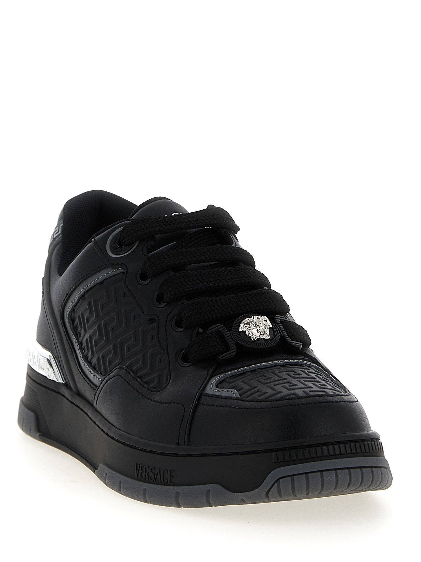 Athletic Sneakers by Versace for men in calfskin leather black showcases an impeccable silhouette, defined by an impeccable athletic style design that perfectly captures the essence of the Medusa Men's Athletic Calfskin Leather Sneakers.
