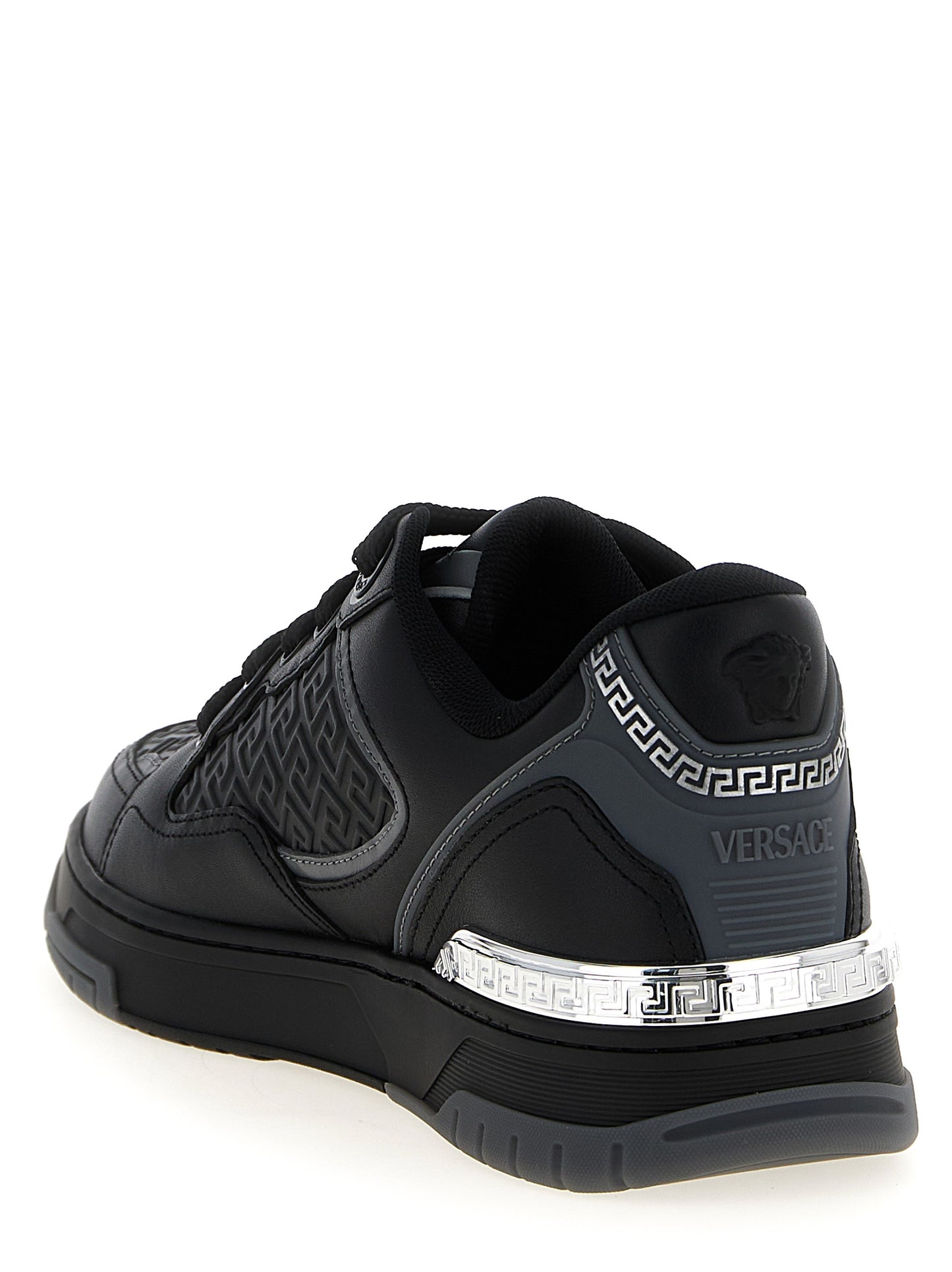 Athletic Sneakers by Versace for men in calfskin leather black presents a sleek silhouette, perfectly capturing the athletic style essence of Medusa Men's Athletic Calfskin Leather Sneakers with its sleek design and premium finish.