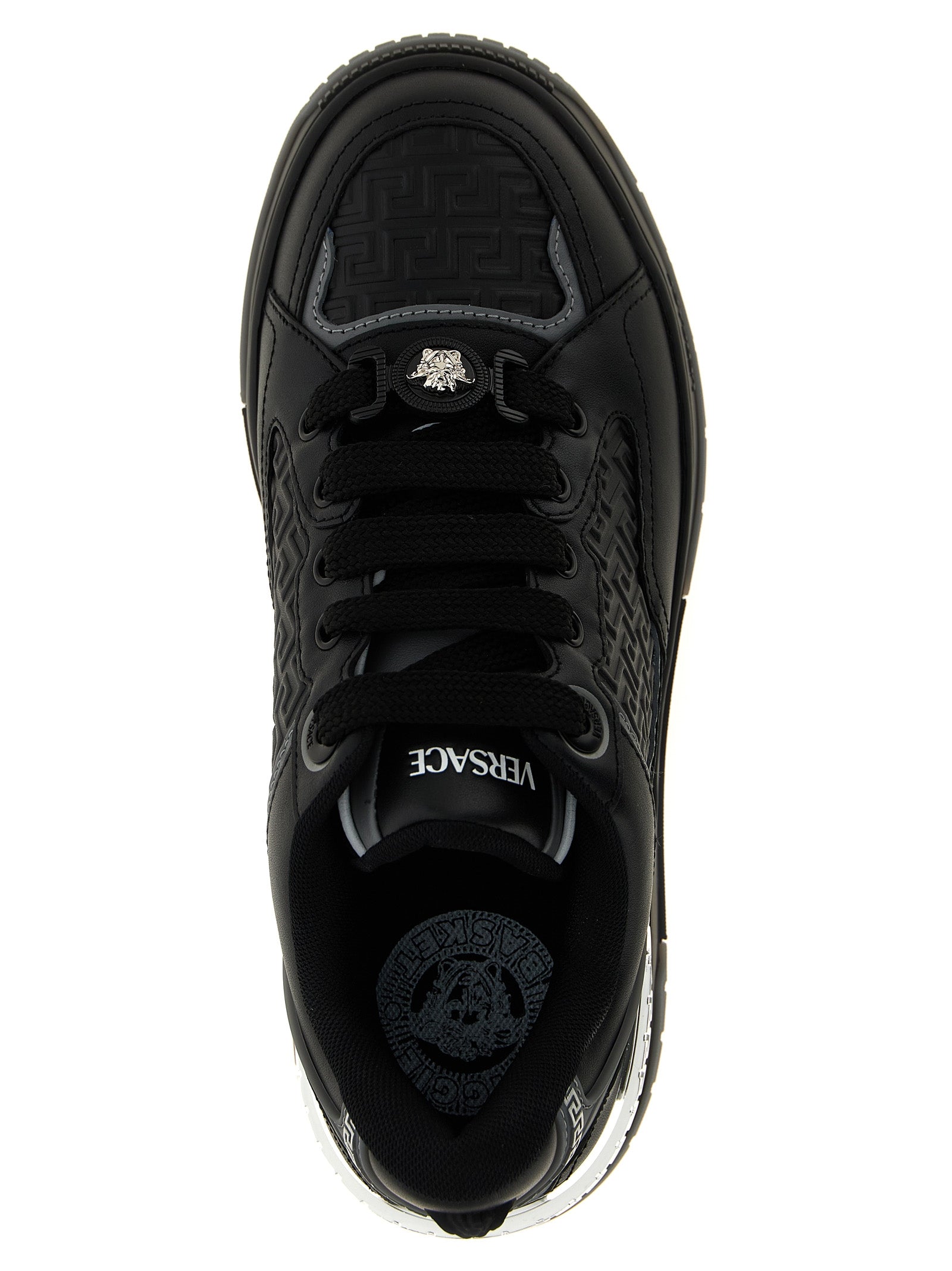 Athletic Sneakers by Versace for men in calfskin leather black features an timeless silhouette from the Medusa Men's Athletic Calfskin Leather Sneakers collection, showcasing a timeless athletic style for a timeless look.