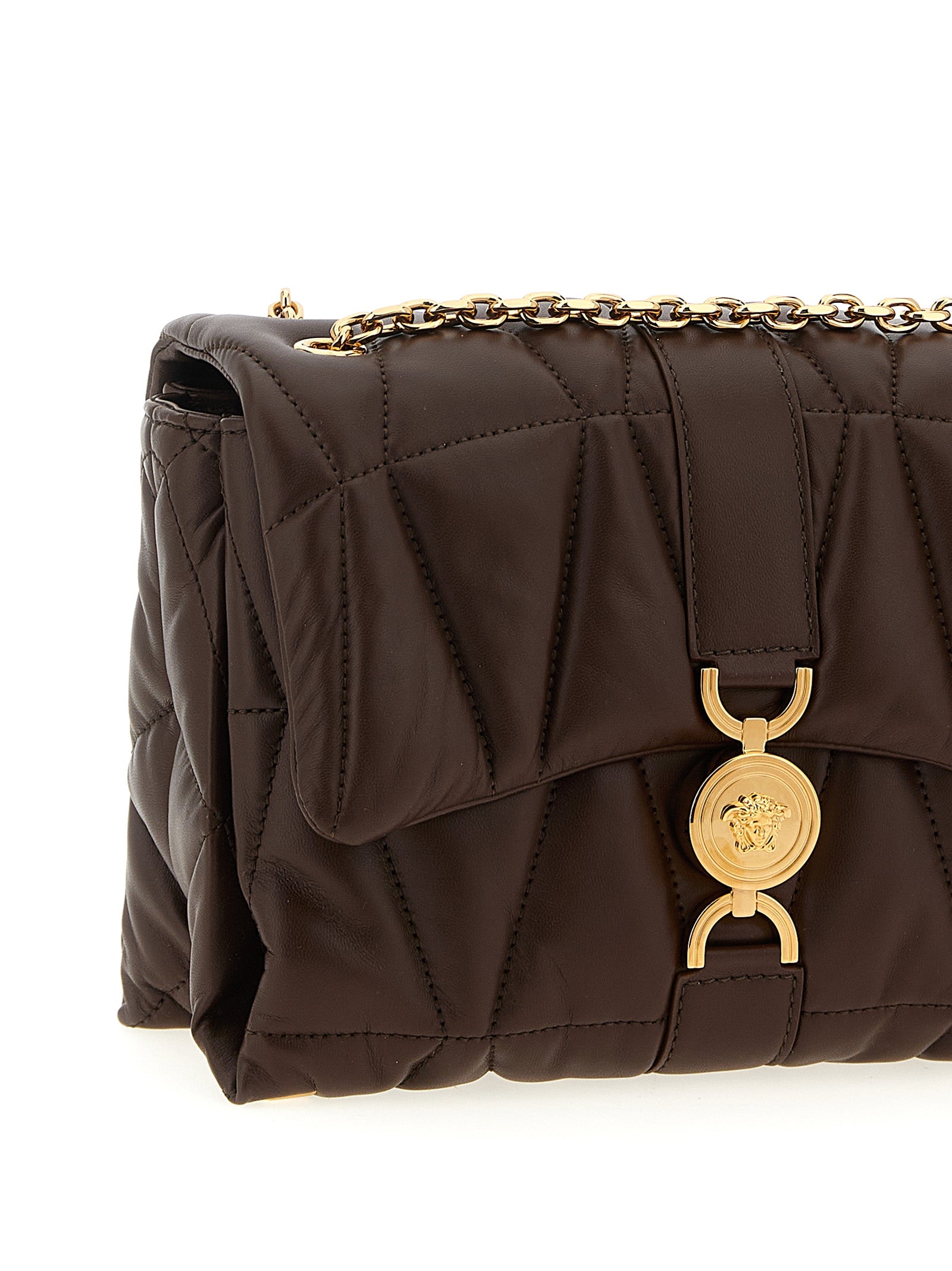 Quilted Shoulder Flap Bag by Versace for women in lamb leather brown features a stately silhouette, showcasing a secure flap & magnetic, ample , and stately shoulder-strap for a stately finish.