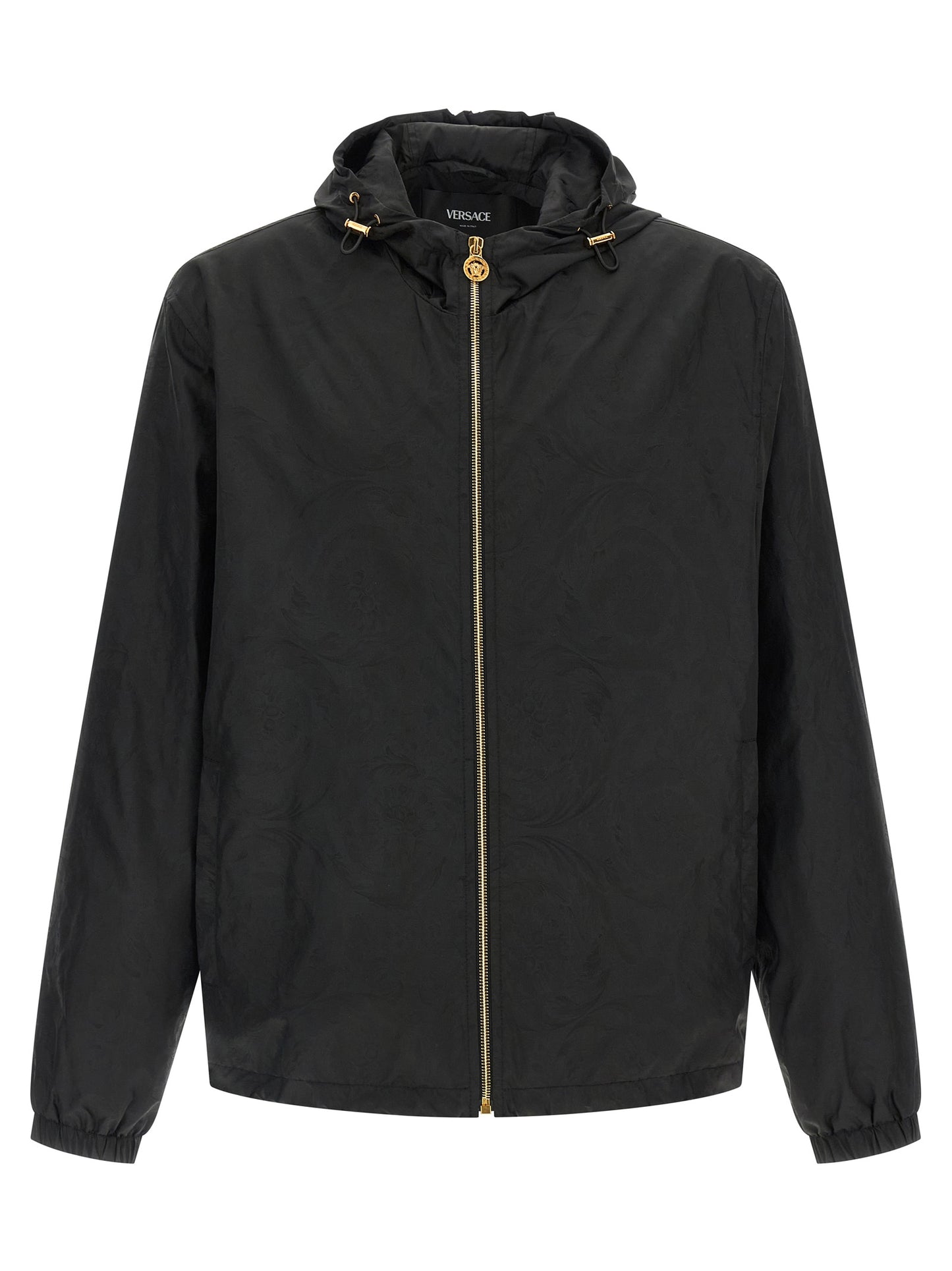Hooded Windbreaker Jacket by Versace for men in nylon black, patterned & jacquard presents a resilient silhouette, artfully detailed with a sophisticated hooded neckline and functional hooded & windproof for a resilient finish.