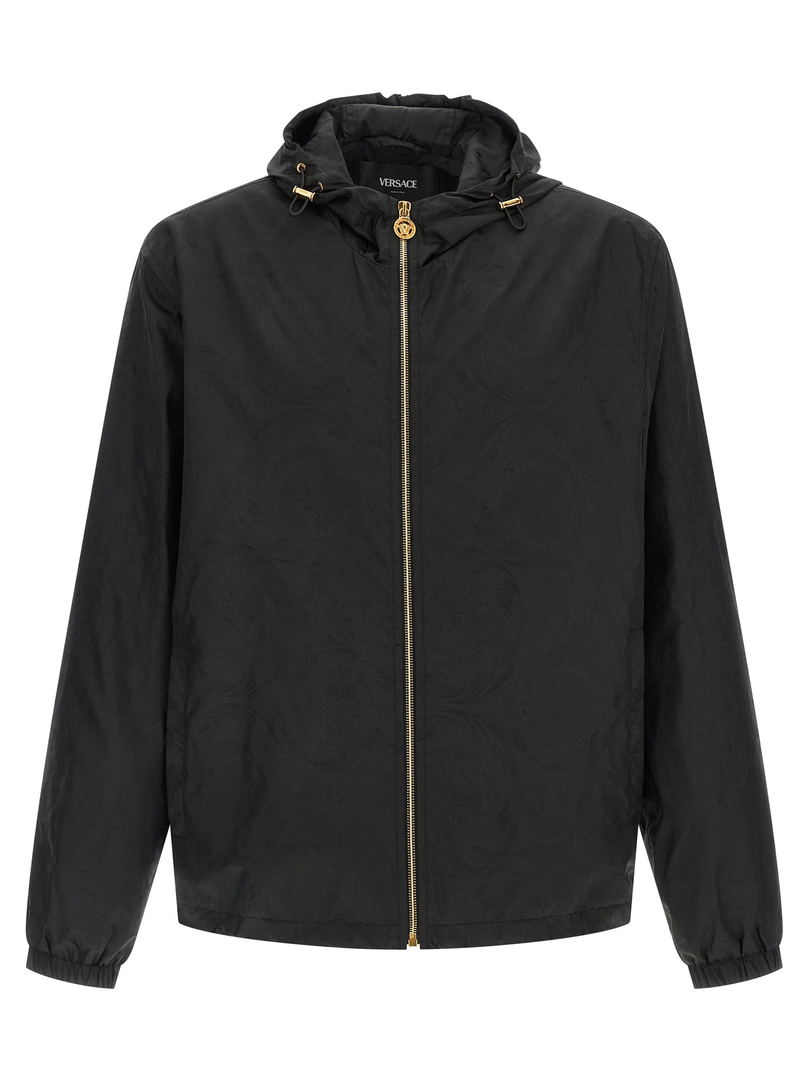 Hooded Windbreaker Jacket by Versace for men in nylon black, patterned & jacquard presents a resilient silhouette, artfully detailed with a sophisticated hooded neckline and functional hooded & windproof for a resilient finish.