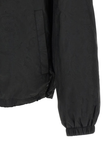 Hooded Windbreaker Jacket by Versace for men in nylon black, patterned & jacquard features an enduring silhouette, showcasing technical hooded & windproof and a sophisticated for a truly enduring aesthetic.