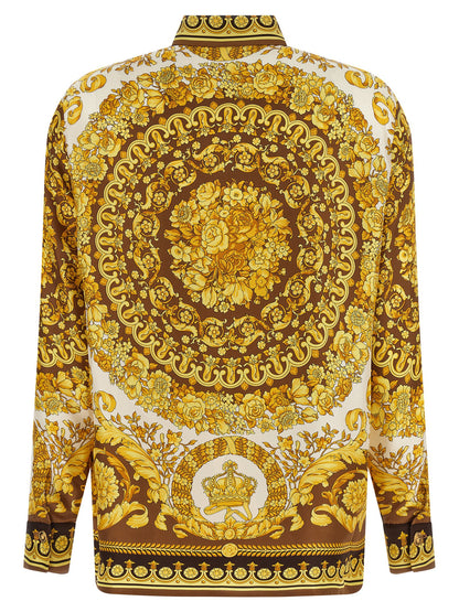 Blouse by Versace for women in silk twill gold & print presents a discerning silhouette, showcasing a sophisticated and for a truly discerning finish.