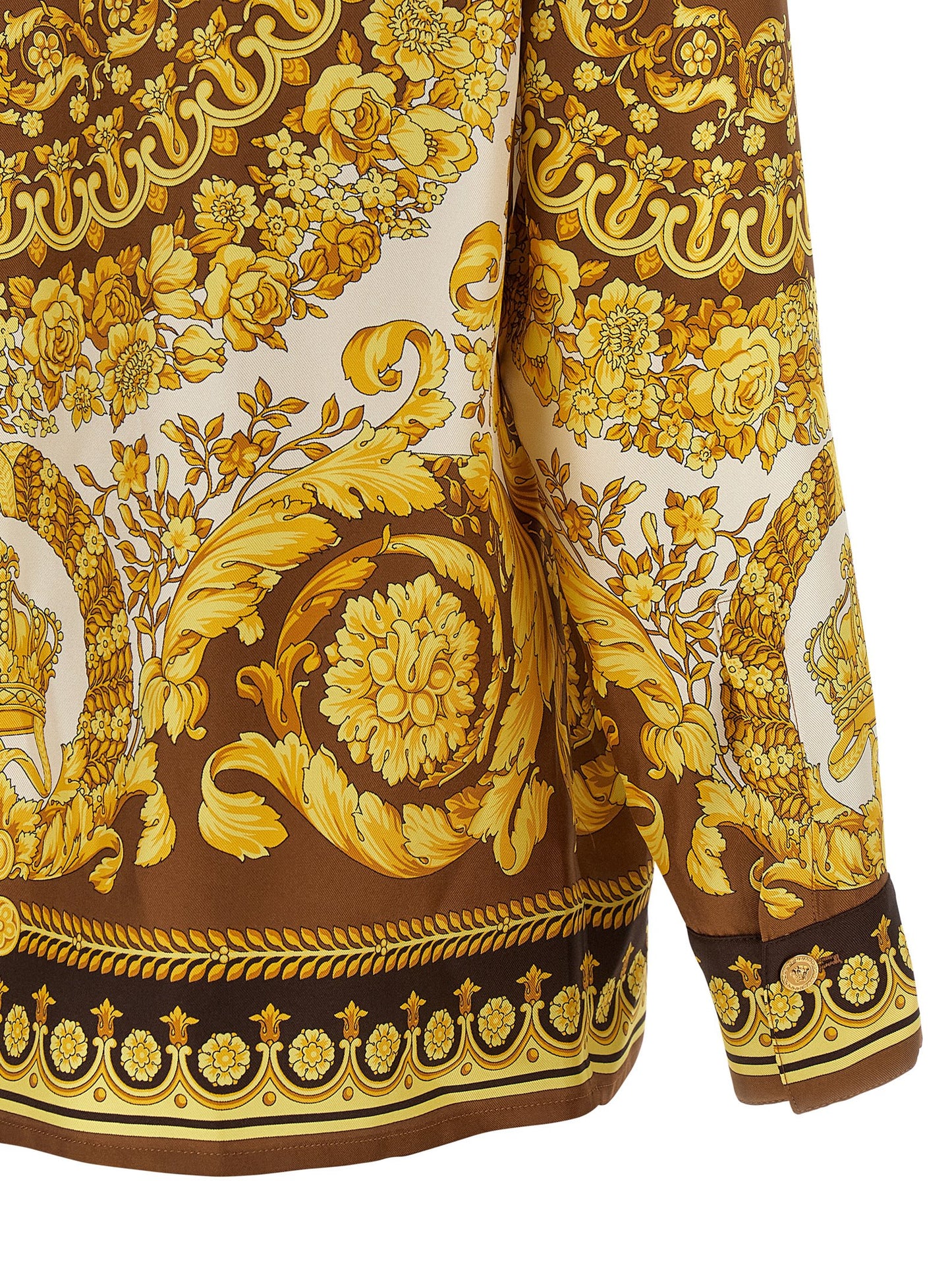 Blouse by Versace for women in silk twill gold & print showcases a sharp silhouette, elegantly detailed with a sharp and sharp .