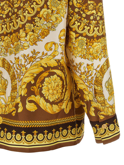 Blouse by Versace for women in silk twill gold & print showcases a sharp silhouette, elegantly detailed with a sharp and sharp .