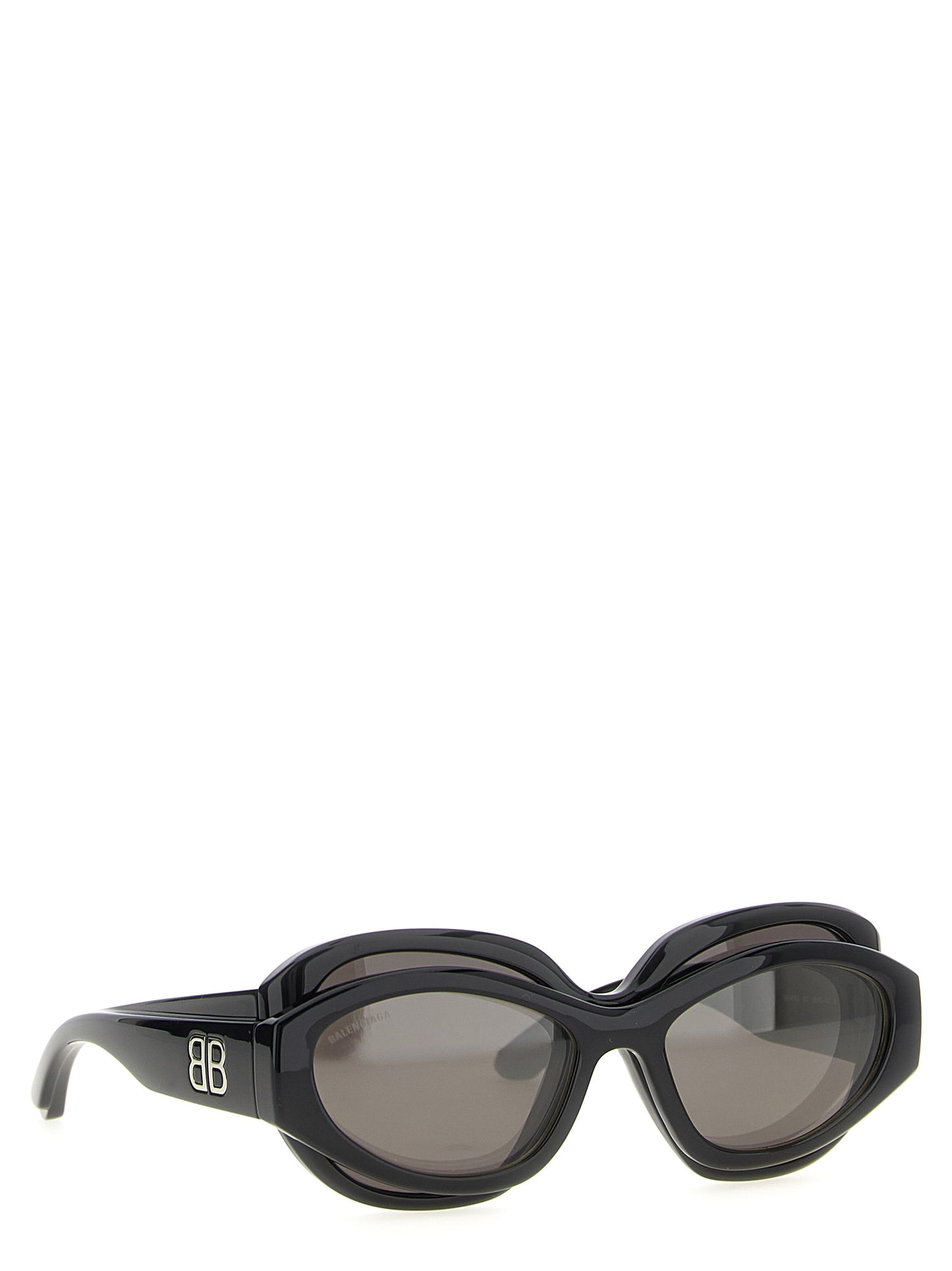 This Sunglasses by Balenciaga for women in viscose cotton canvas & lambskin leather black presents a sumptuous silhouette, showcasing a sumptuous round frame design in black coloured frame and high-performance .