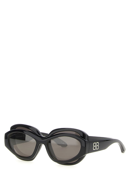 Sunglasses by Balenciaga for women in viscose cotton canvas & lambskin leather and black featuring an stylish round frame design with a sophisticated black coloured frame finish and high-performance .