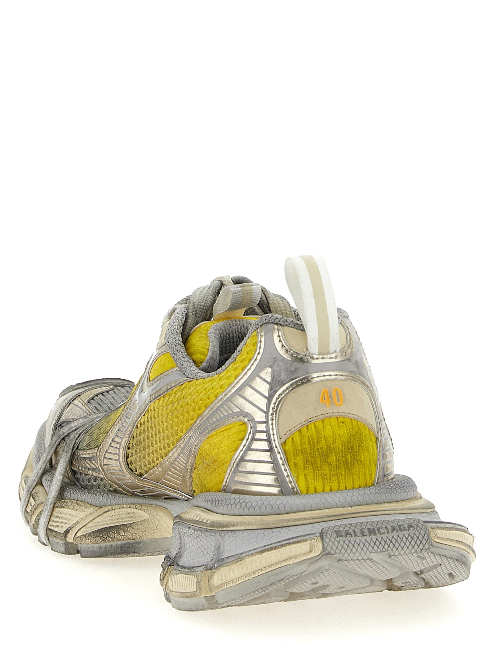 Athletic Sneakers by Balenciaga for men in polyester polyethylene & polyurethane bicolour & yellow showcases a architectural silhouette, artfully capturing the essence of the Men's Athletic Polyester Polyethylene & Polyurethane Sneakers with its signature architectural athletic style construction.