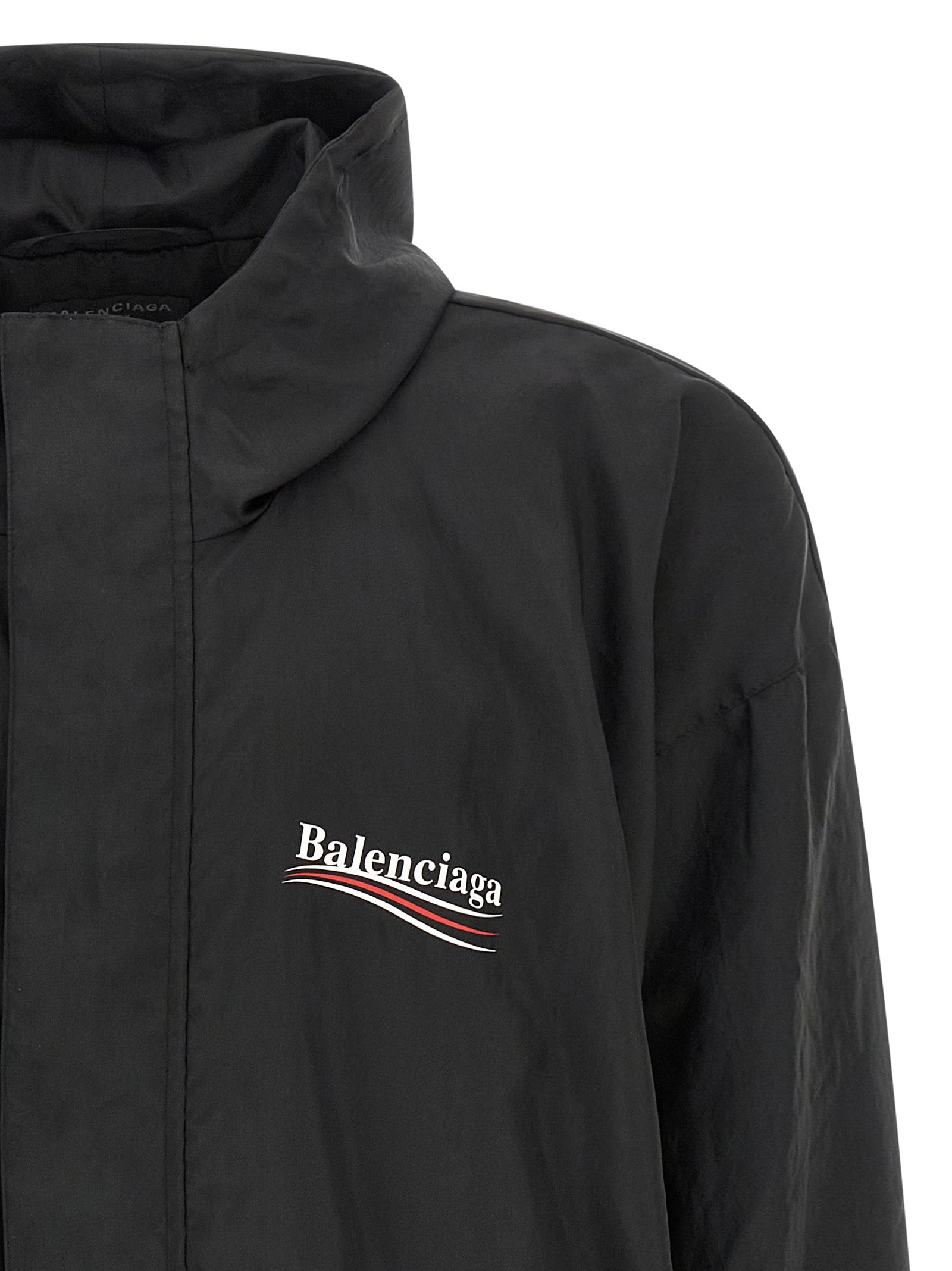 Hooded Windbreaker Jacket by Balenciaga for men in polyester black showcases a modern silhouette, integrating hooded & windproof and a modern hooded neckline for a sophisticated finish.