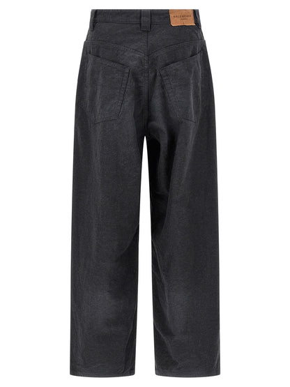 Joggers by Balenciaga for men in denim cotton gray features a polished silhouette with a polished , reaching a polished long and finished with a polished .