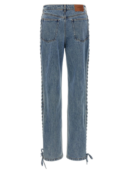 Jeans by ROTATE BIRGER CHRISTENSEN for women in organic denim cotton & leather blue presents a tailored silhouette, showcasing a tailored straight-leg and long cut with a refined for a truly tailored aesthetic.
