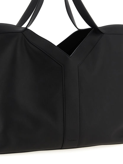 This Large Shopper Tote Bag by Saint Laurent for men in suede calfskin leather black features an on trend Suede Calfskin Leather Large Shopper Tote Bag design with a secure snap & hook, ample , and on trend handle.