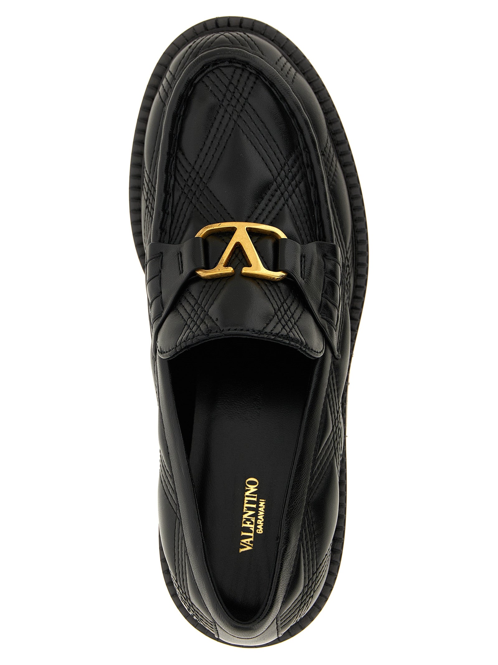 Flat Loafer Slip-On Shoes by Valentino Garavani for women in lamb leather black & signature features an ergonomic silhouette, perfectly showcasing V Logo Women's Lamb Leather Flat Loafer Slip-On Shoes with its distinct flat and elegant .
