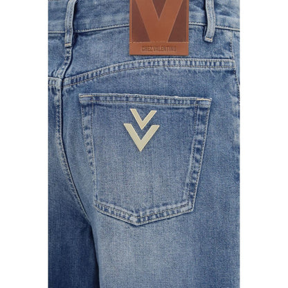 Jeans by Valentino Garavani for women in denim cotton blue & signature presents a refined pantology silhouette, artfully defined by a refined pantology straight-leg & regular-fit, long, and a sophisticated .
