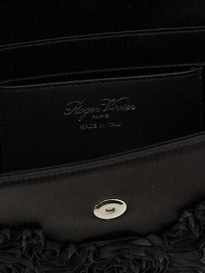 Shoulder Evening Flap Clutch Handbag by Roger Vivier for women in polyester polyurethane python leather & rhinestone black & floral features a architectural silhouette, showcasing a secure flap & magnetic, ample , and versatile shoulder-strap for a architectural finish.