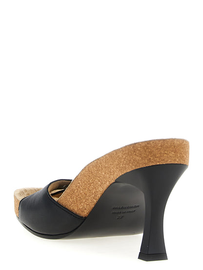 Stiletto Sandals by Balenciaga for women in bos taurus calfskin leather & cork black presents a sculptural silhouette, showcasing the Women's Bos Taurus Calfskin Leather & Cork Stiletto Sandals design with a sculptural stiletto and for a premium look.