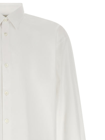 Shirt by Dries Van Noten for men in cotton white showcases a sleek silhouette, elegantly detailed with a sleek and for a sleek finish.