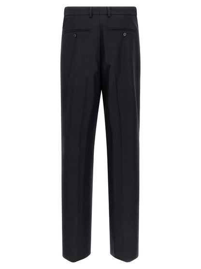 Trousers by Dries Van Noten for men in wool blue, patterned & herringbone features an sartorial silhouette, showcasing a precise straight-leg & wide and long with a sartorial for a refined look.