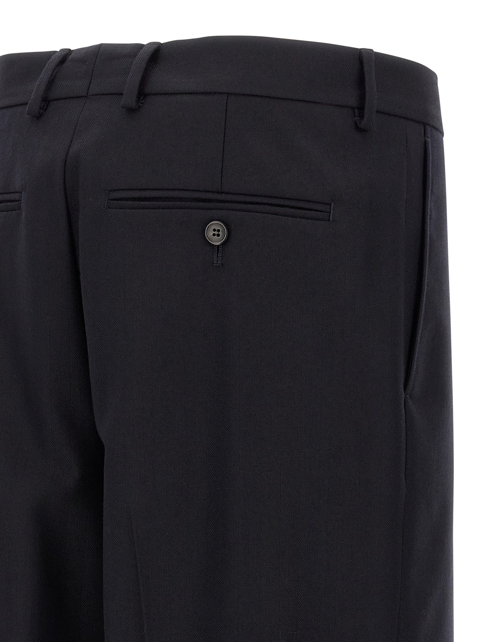 Trousers by Dries Van Noten for men in wool blue, patterned & herringbone presents a perennial silhouette, meticulously tailored with a straight-leg & wide cut, long finish, and an elegant .