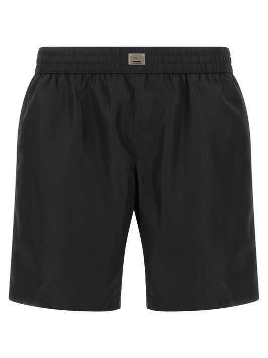 Swim Shorts by Dolce & Gabbana for men in stretch nylon black features a magnificent design, channeling the luxury vibe of Men's Stretch Nylon Swim Shorts.