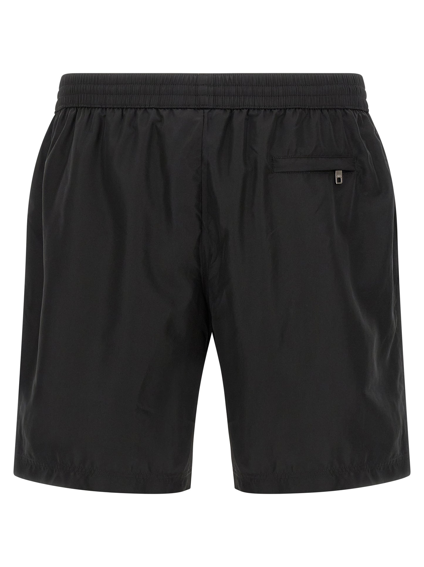 Swim Shorts by Dolce & Gabbana for men in stretch nylon black features a resort ready silhouette, capturing the beach-ready style of the Men's Stretch Nylon Swim Shorts collection.