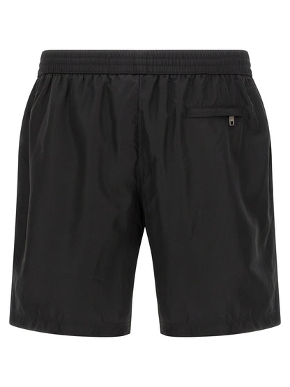 Swim Shorts by Dolce & Gabbana for men in stretch nylon black features a resort ready silhouette, capturing the beach-ready style of the Men's Stretch Nylon Swim Shorts collection.