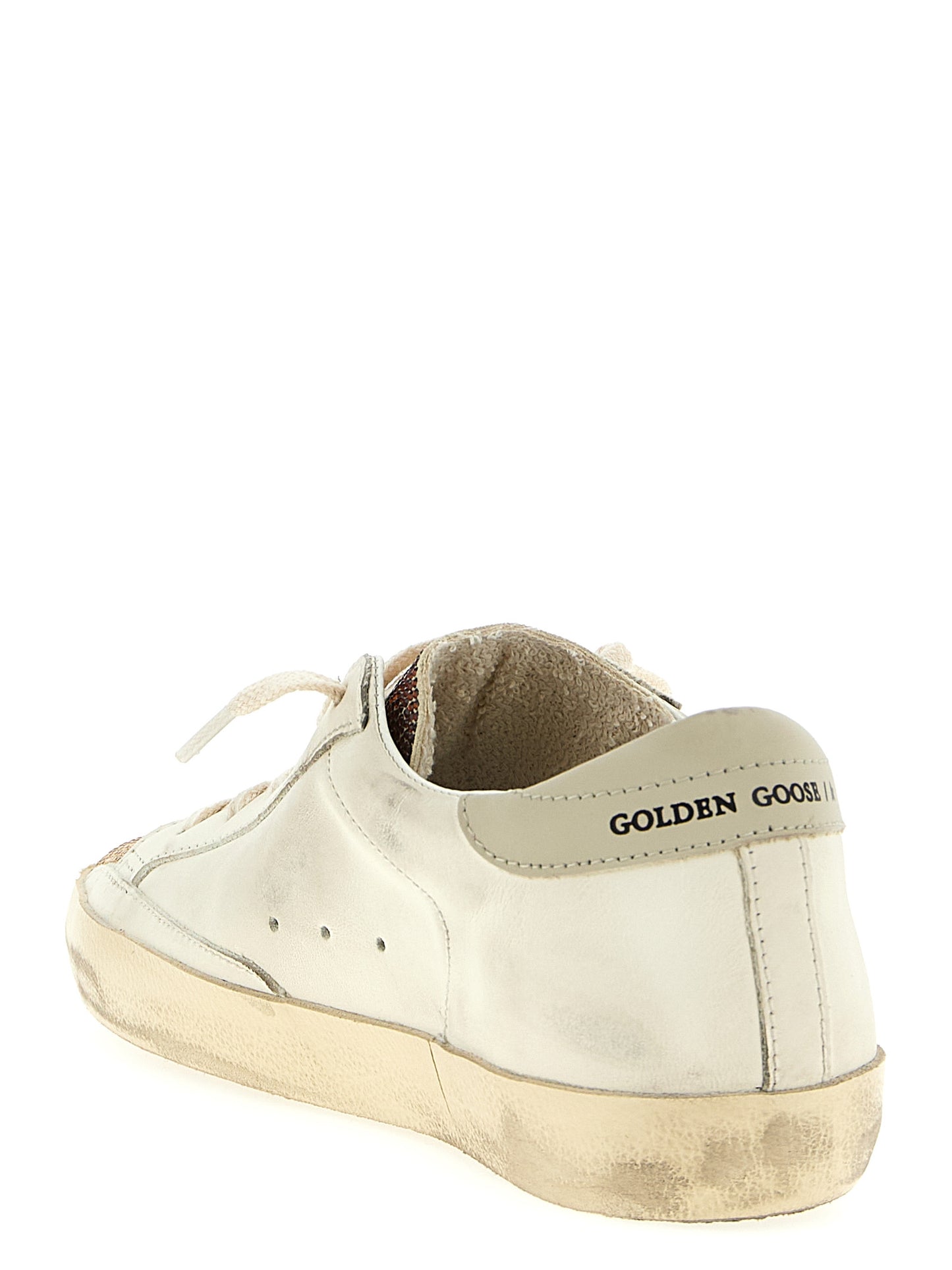 Sneakers by Golden Goose for women in cowhide leather & crystal multicolor features a chic design, perfectly showcasing the chic low-top style of this Women's Low Top Cowhide Leather & Crystal Sneakers.
