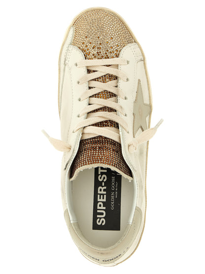 Sneakers by Golden Goose for women in cowhide leather & crystal multicolor presents a impeccable silhouette as Women's Low Top Cowhide Leather & Crystal Sneakers, expertly defined by a impeccable low-top style for a impeccable, high-fashion look.