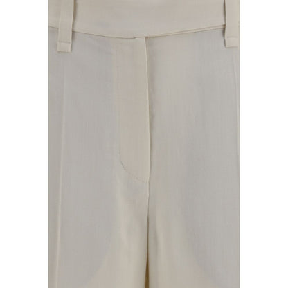 Casual Pants by Brunello Cucinelli for women in viscose linen twill beige & signature presents a refined pantology silhouette, artfully defined by a refined pantology flared, regular-fit & cigarette, long, and a sophisticated .