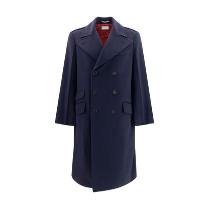 Overcoat by Brunello Cucinelli for men in merino wool blue showcases a enveloping silhouette, detailed with distinctive pockets and a enveloping lapel neckline.