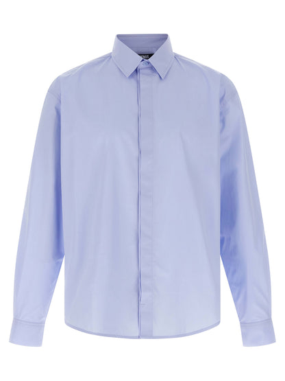 Shirt by Jacquemus for men in cotton light-blue showcases a sharp silhouette, elegantly detailed with a sharp and sharp .