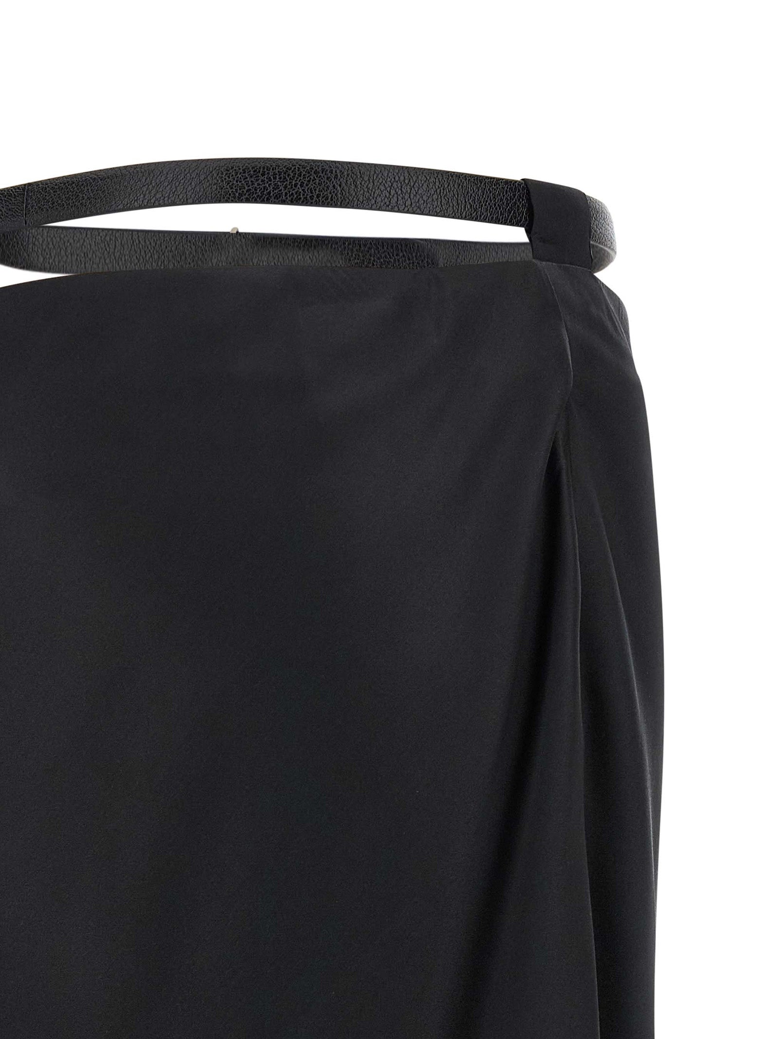 Skirt by Tom Ford for women in silk black showcases a dramatic silhouette, artfully capturing the essence of the Women's Silk Skirt in a dramatic midi cut for a refined look.