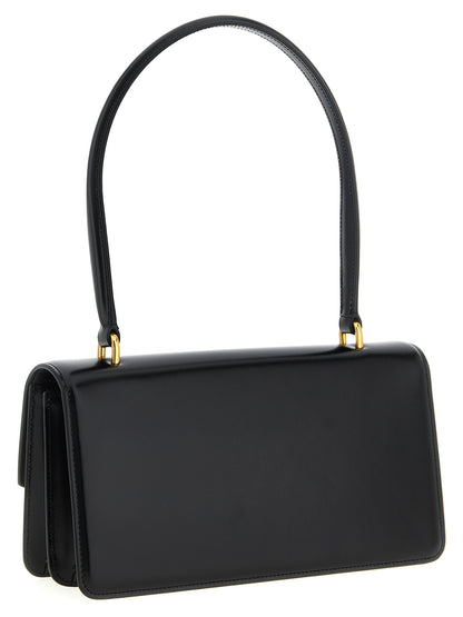 Shoulder Flap Bag by Valentino Garavani for women in calfskin nappa leather black & signature features an effortlessly chic silhouette with a secure flap & magnetic, ample , and versatile shoulder-strap & handle for effortlessly chic everyday luxury.