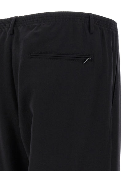 Trousers by CELLAR DOOR for men in wool black features an sartorial silhouette, showcasing a precise straight-leg and long with a sartorial for a refined look.