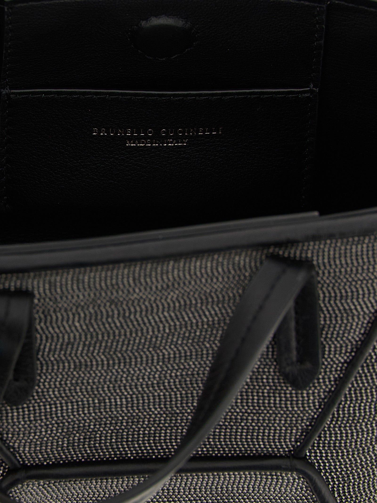 Mini Crossbody Handbag by Brunello Cucinelli for women in lambskin leather black & signature features a contemporary silhouette, showcasing a secure magnetic, ample , and contemporary crossbody-strap, shoulder-strap, adjustable-strap & handle for a sophisticated look.