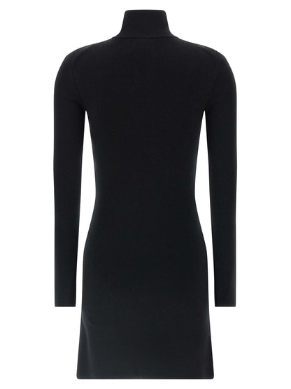 Dress by Courrèges for women in merino wool black features an magnificent silhouette, artfully detailed with a magnificent and that flows into an magnificent short mini.