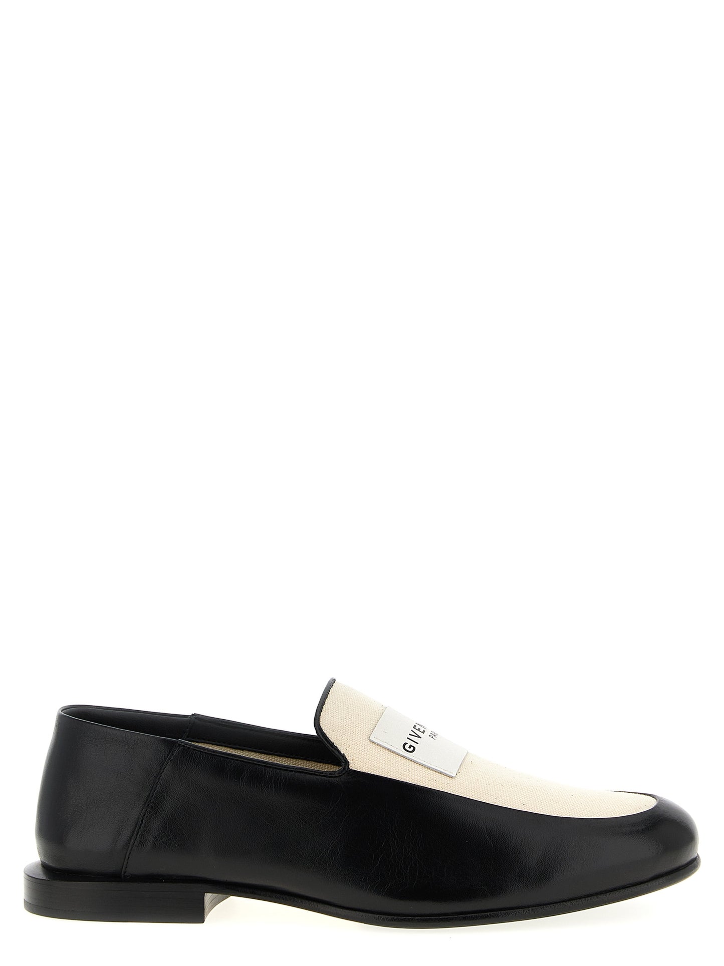 Flat Loafer Slip-On Shoes by Givenchy for women in cotton canvas & lamb leather black showcases a impeccable silhouette as Women's Cotton Canvas & Lamb Leather Flat Loafer Slip-On Shoes, artfully designed with a impeccable flat and refined for a impeccable finish.