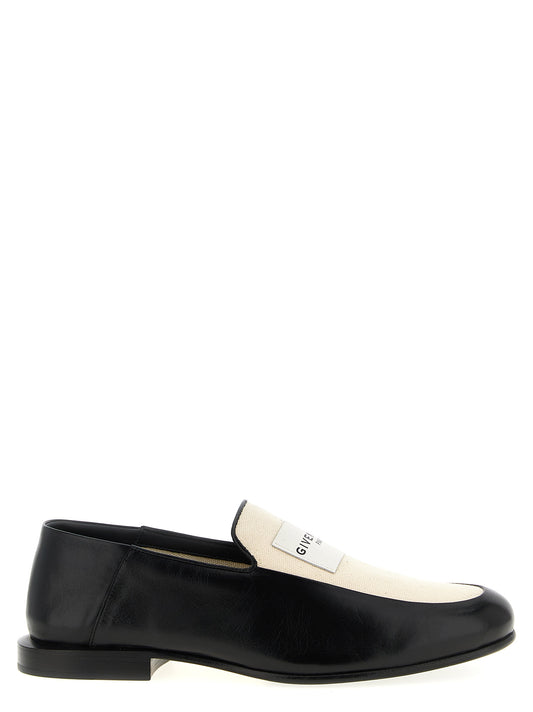 Flat Loafer Slip-On Shoes by Givenchy for women in cotton canvas & lamb leather black showcases a impeccable silhouette as Women's Cotton Canvas & Lamb Leather Flat Loafer Slip-On Shoes, artfully designed with a impeccable flat and refined for a impeccable finish.