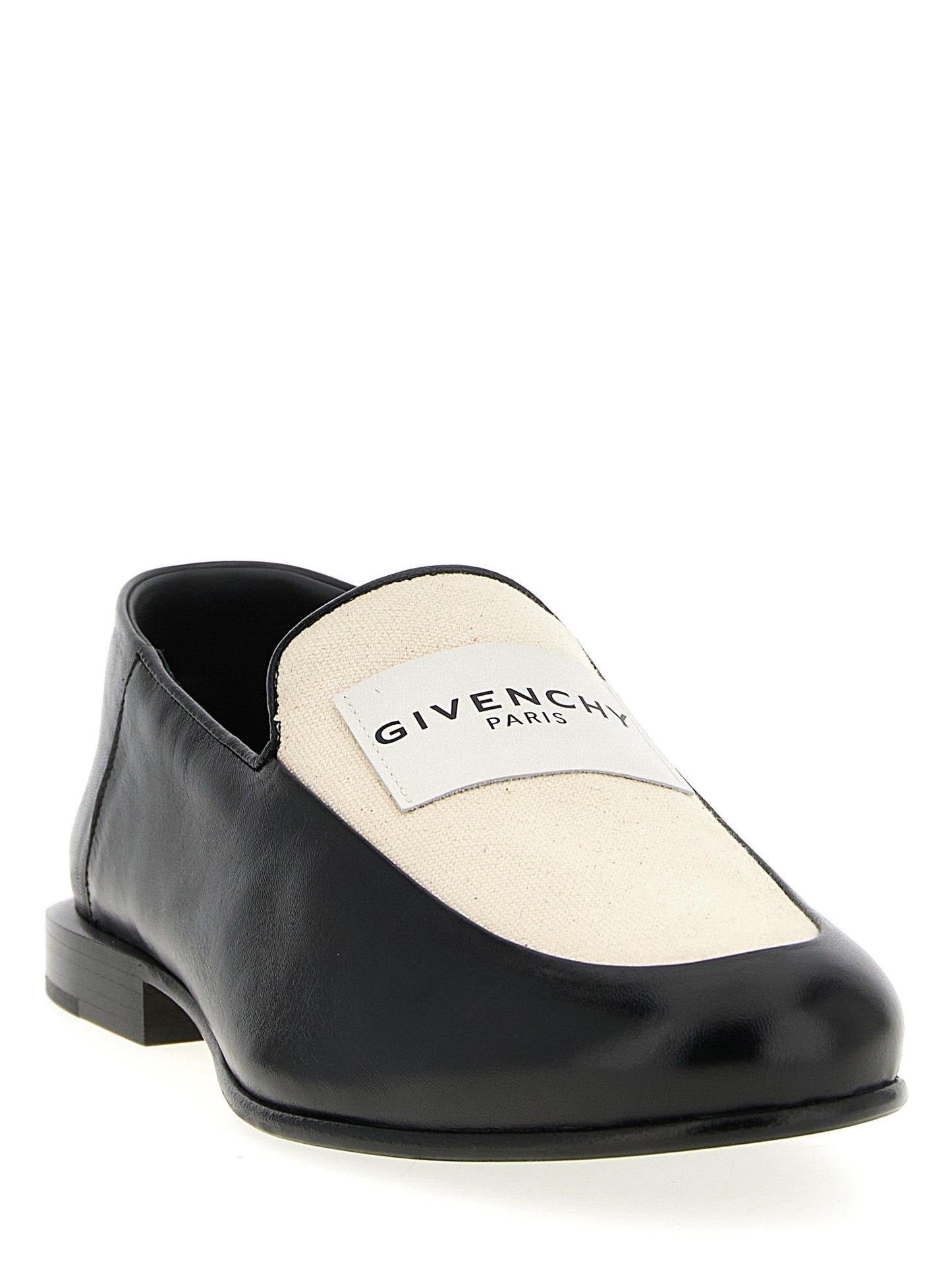 Flat Loafer Slip-On Shoes by Givenchy for women in cotton canvas & lamb leather black showcases a resplendent Women's Cotton Canvas & Lamb Leather Flat Loafer Slip-On Shoes aesthetic, defined by its resplendent and elegant flat.