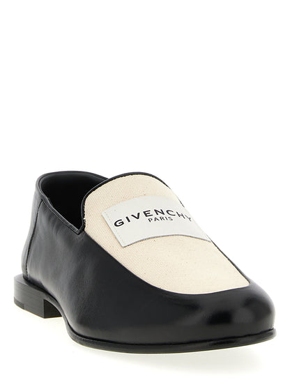 Flat Loafer Slip-On Shoes by Givenchy for women in cotton canvas & lamb leather black showcases a resplendent Women's Cotton Canvas & Lamb Leather Flat Loafer Slip-On Shoes aesthetic, defined by its resplendent and elegant flat.