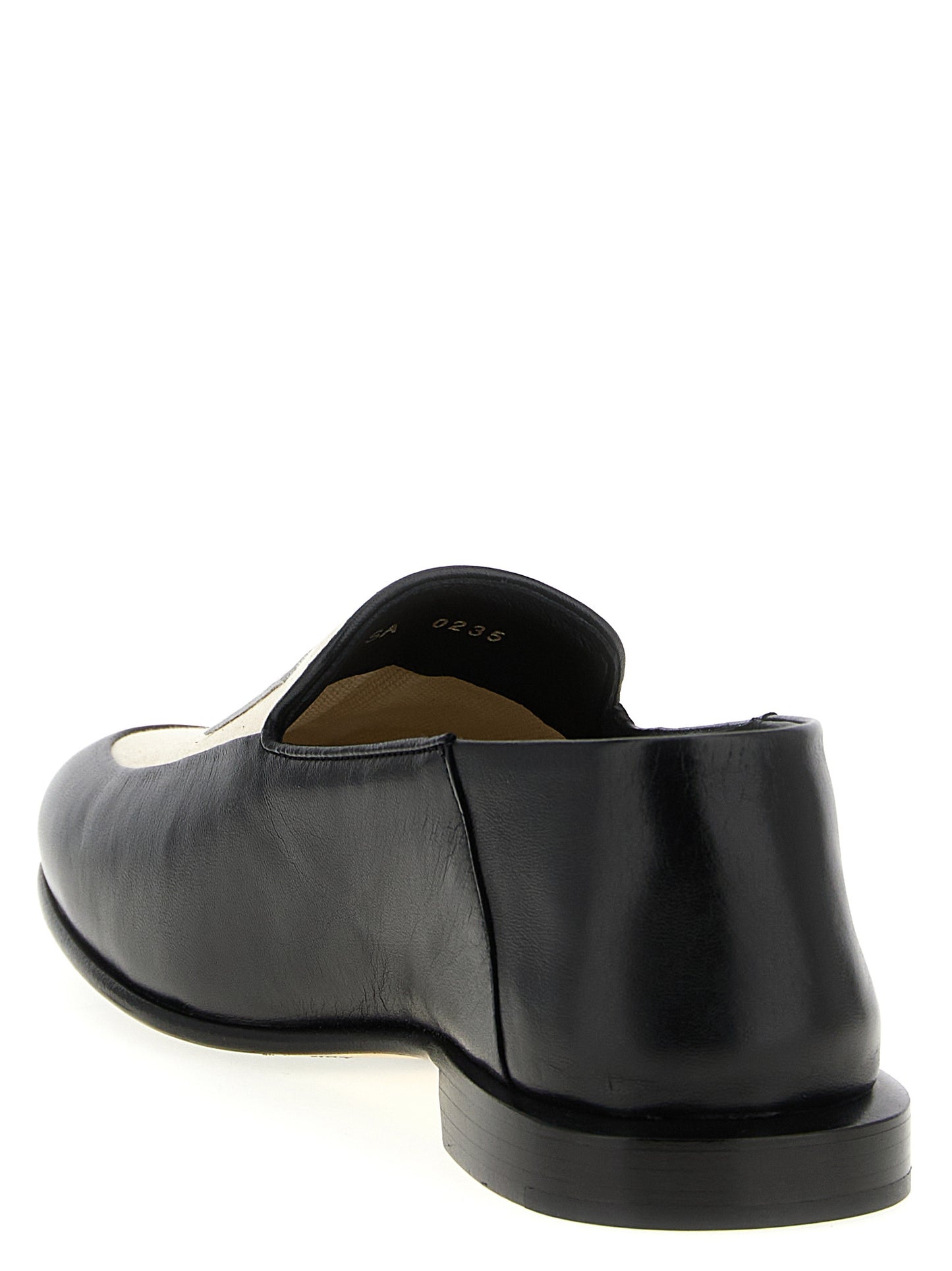 Flat Loafer Slip-On Shoes by Givenchy for women in cotton canvas & lamb leather black features an ergonomic silhouette, perfectly showcasing Women's Cotton Canvas & Lamb Leather Flat Loafer Slip-On Shoes with its distinct flat and elegant .