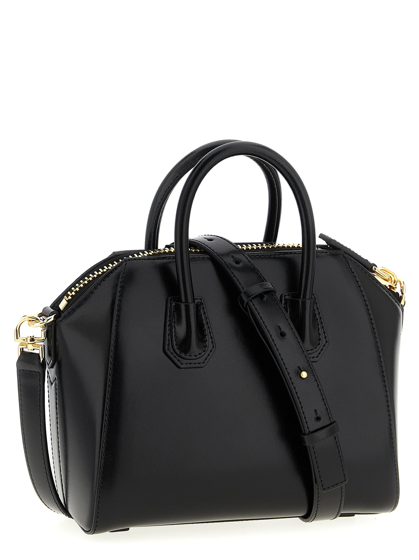 Mini Evening Handbag by Givenchy for women in calfskin leather black & silver presents a ornamental silhouette, showcasing a secure , ample , and versatile shoulder-strap, handle & detachable-strap for a ornamental finish.