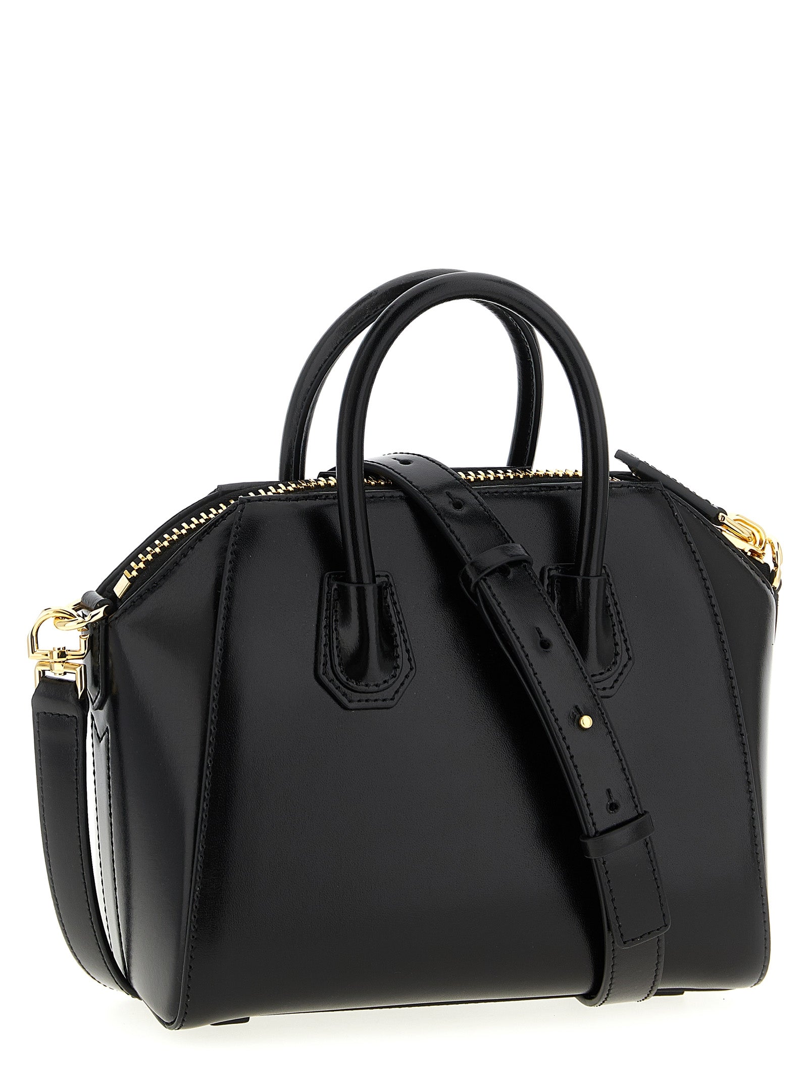 Mini Evening Handbag by Givenchy for women in calfskin leather black & silver presents a ornamental silhouette, showcasing a secure , ample , and versatile shoulder-strap, handle & detachable-strap for a ornamental finish.