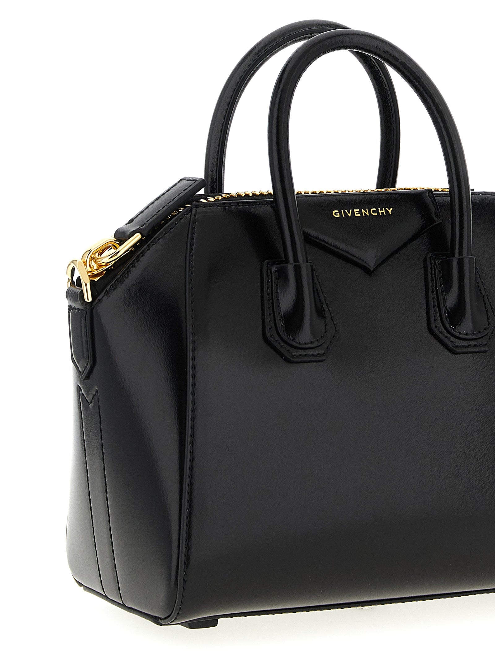 Mini Evening Handbag by Givenchy for women in calfskin leather black & silver features a exquisite silhouette, showcasing a secure and exquisite with versatile shoulder-strap, handle & detachable-strap for a exquisite finish.